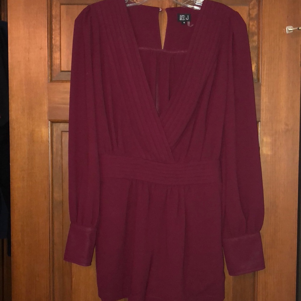 Romper. Size Medium